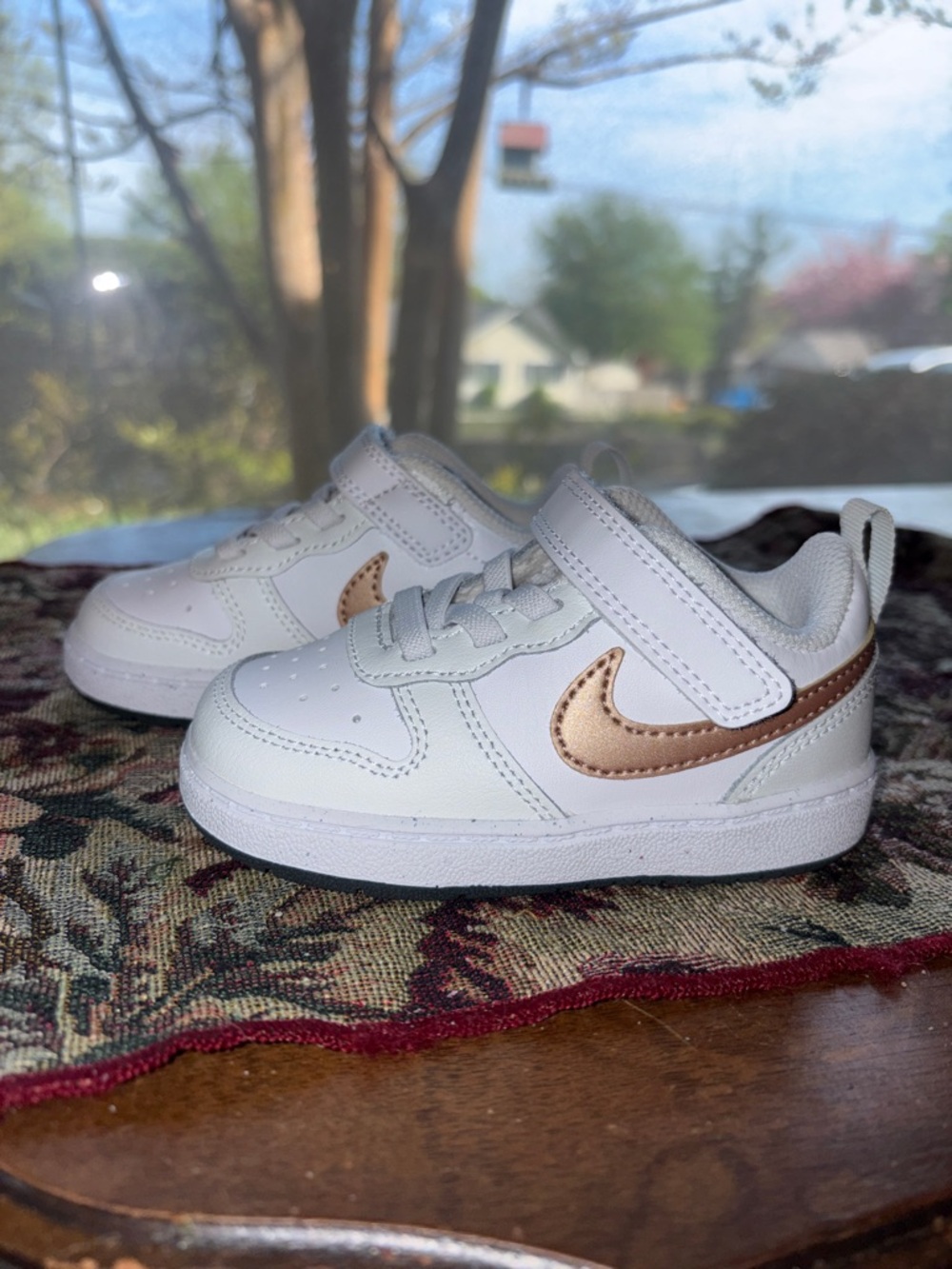 Nike Kids White Sneakers with Rose Gold Swoosh